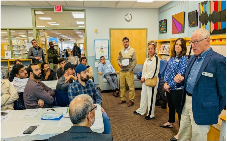 Open Doors for Refugees, the Leagues of Women Voters, the Catholic MultiCultural Center and the Literacy Network speaking at the Immigrant Town Hall
